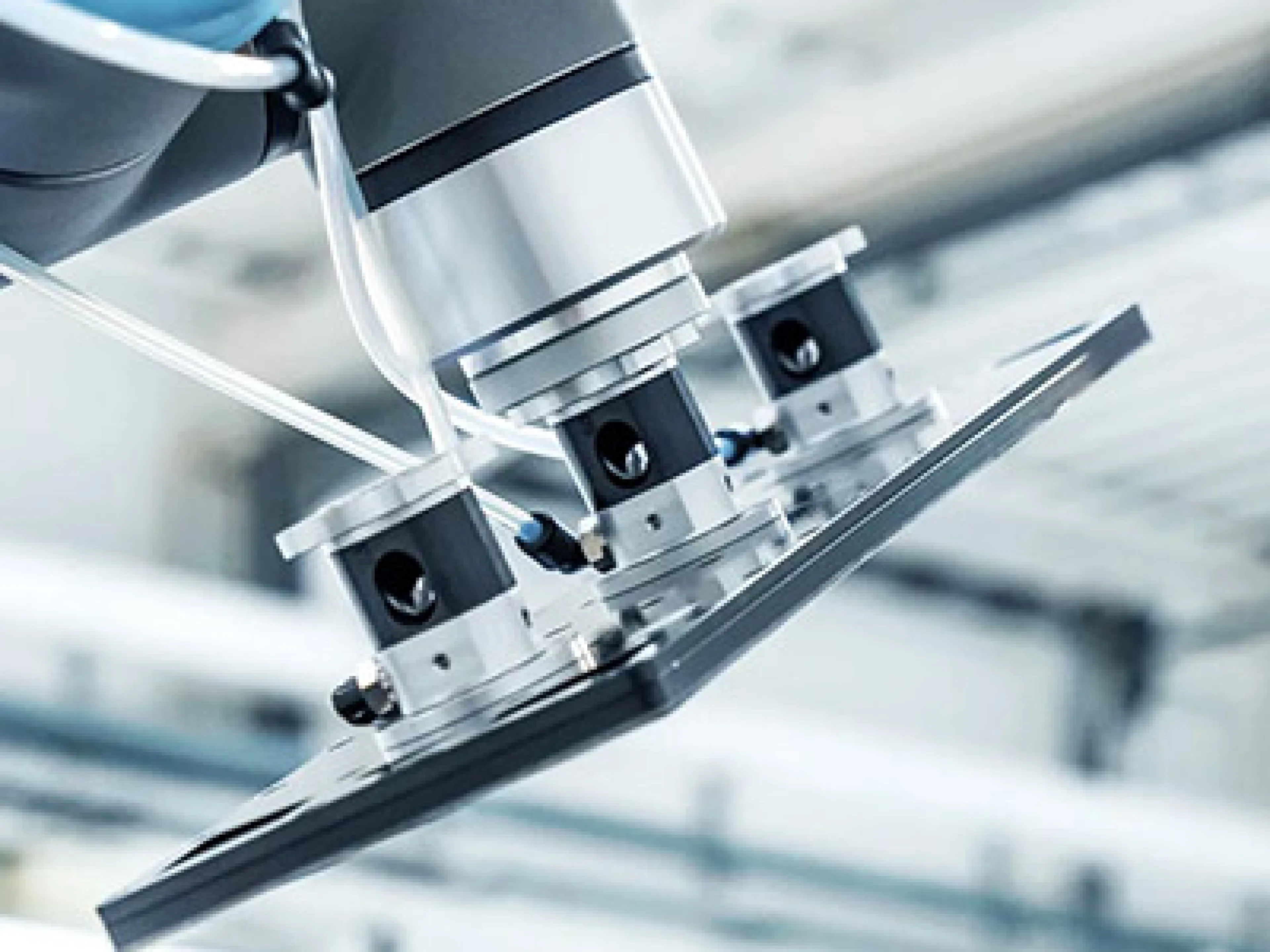 Flächengreifer FLGR mit hohem Volumenstrom zum vollflächigen Greifen von sensiblen Werkstücken wie Membran-Elektroden-Anordnungen (MEA) und Bipolarplatten (BPP)