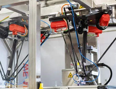 Das Herzstück der Anlage bildet ein Tripod-Roboter, angetrieben durch Servomotoren der Baureihe CMP mit „PxG“-Getrieben in der Ausführung P5, Bild: SEW-Eurodrive Tripod von Seitec