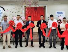 Mit dem Durchschneiden des roten Bandes wurde das Joint Venture in China offiziell eröffnet