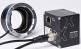 Der SVS-EF-Adapter ermöglicht eine Autofokus-Funktion der eingesetzten Kamera, um Bilder der eingehenden Elektronikgebinde unabhängig von ihrer Höhe aufnehmen zu können