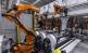 18 Motoman-Roboter arbeiten in der neuen vollautomatischen Schweißanlage für Gerüstteile bei Peri „Hand in Hand"